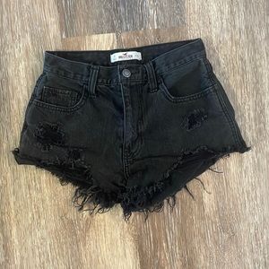 Black denim shorts.